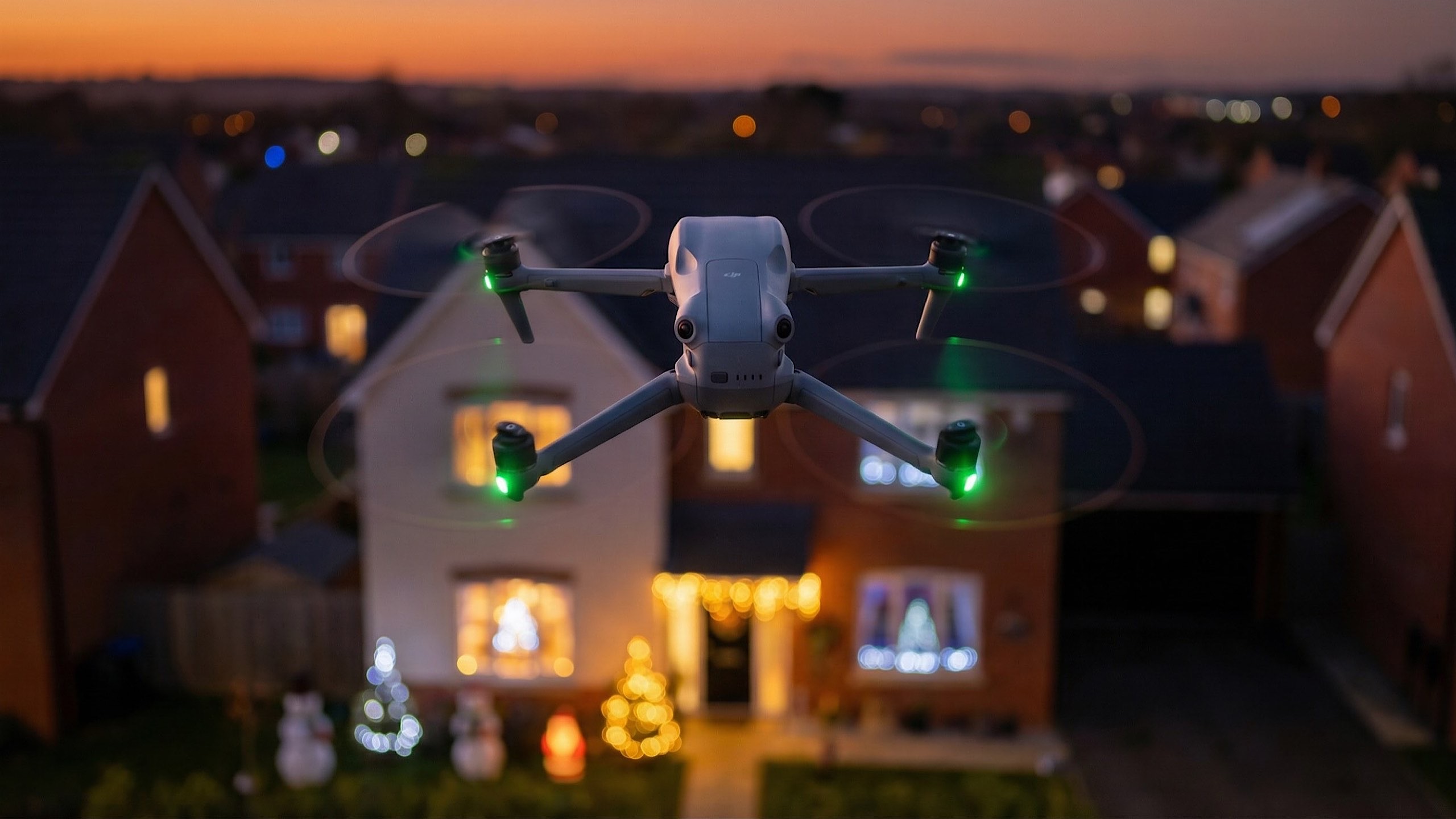 Skyline drone flying over home with Christmas lights at dusk, Northamptonshire aerial photography