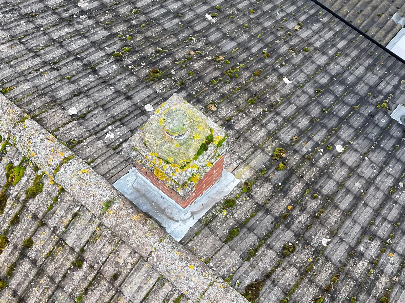Aerial visual image of a chimney and roof by Skyline Visuals